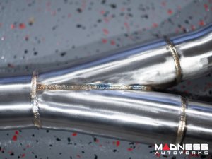 Jaguar F-TYPE Performance Exhaust System - MADNESS - 2.0L Turbo - Center Exit - Vacuum Valve Design - Black Chrome Exhaust Tips Jaguar F-TYPE Performance Exhaust System - MADNESS - 2.0L Turbo - Center Exit - Vacuum Valve Design - Black Chrome Exhaust Tips